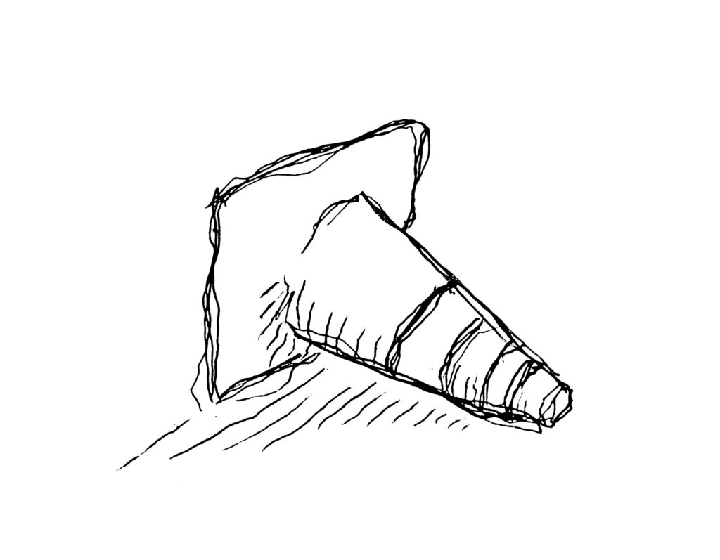 A crude hand-drawn doodle of a traffic cone, toppled over and casting a shadow.